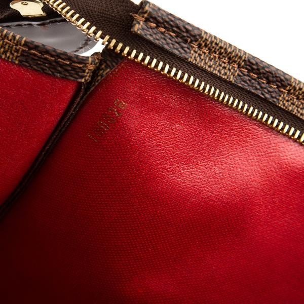 Damier Ebene Clutches Brown