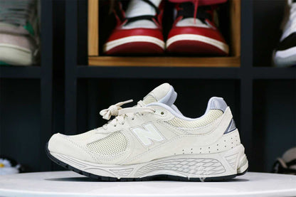 New Balance 2002R Bone Light Aluminum Sneakers